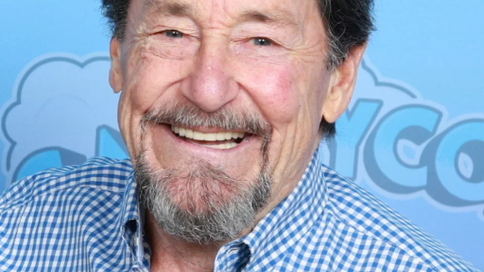 Peter Cullen smiling during a 2024 GalaxyCon Richmond photo appearance